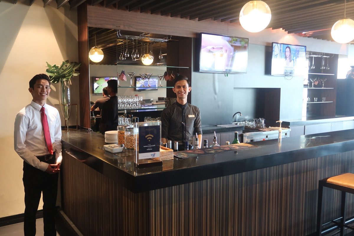 Malaysia Airlines KL Golden Lounge Satellite Terminal bar staff