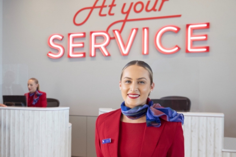 woman smiling in virgin lounge