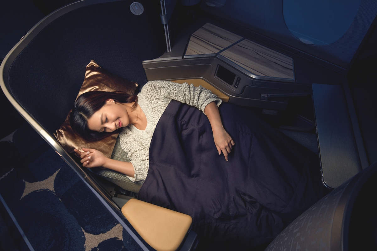 china airlines image of sleeping woman
