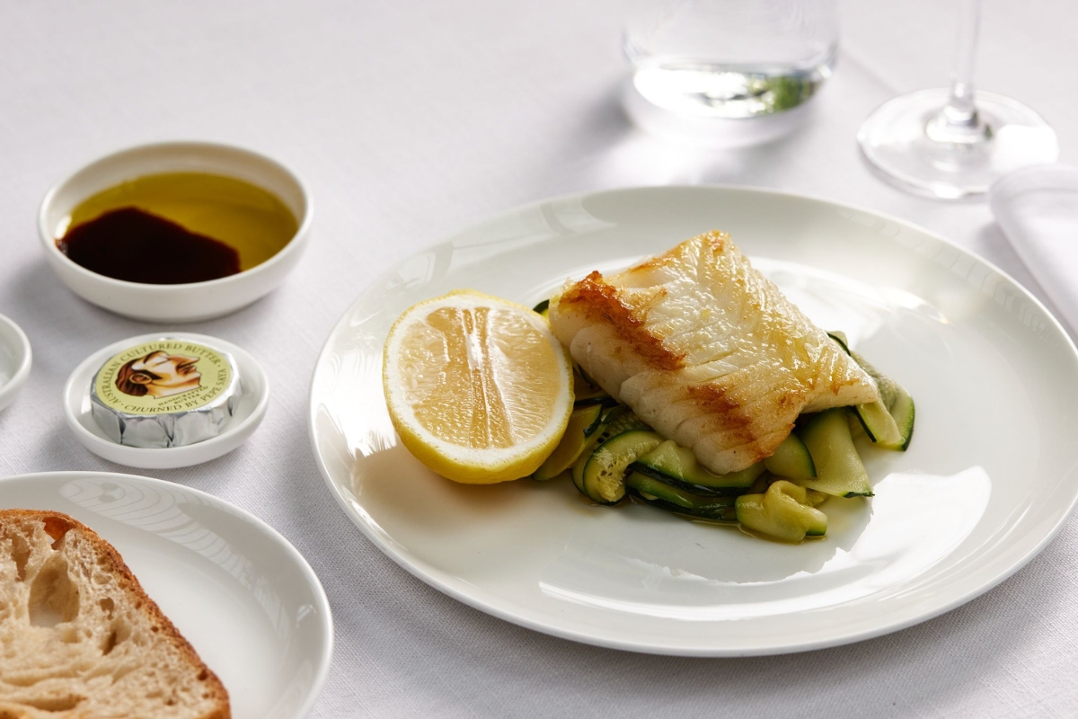 Seared toothfish on a bed of zucchini ribbon will be served in first class